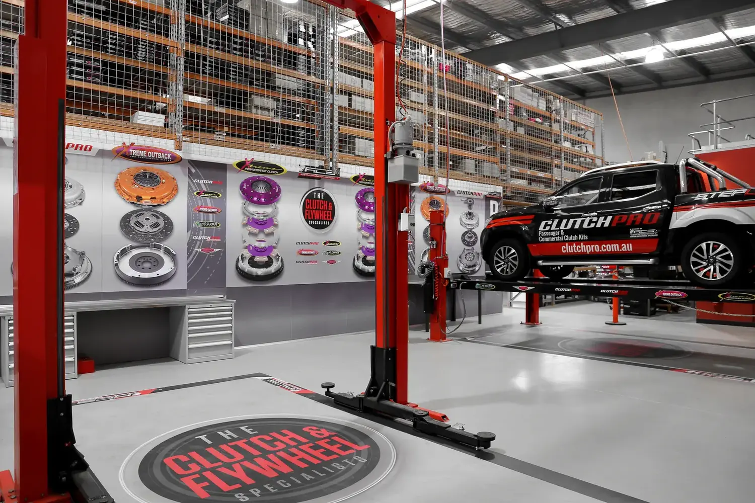 Xtreme Outback Research & Development Workshop - Adelaide, Australia Xtreme Outback R&D workshop with clutch product displays, ClutchPro vehicle, and warehouse facility